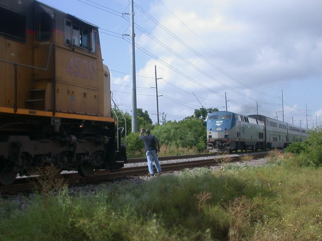 AMTK 140  10Jul2008  NB Train 22 (Texas Eagle) passing SB UP 4529 on the side in SNEED